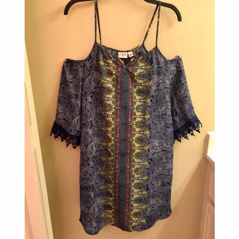 Patterned blue dress.